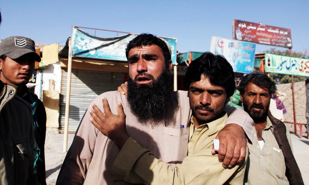 Relatives of police cadets wait for word outside the Police Training Center after an attack on the center in Quetta, Pakistan October 25, 2016. REUTERS/Naseer Ahmed