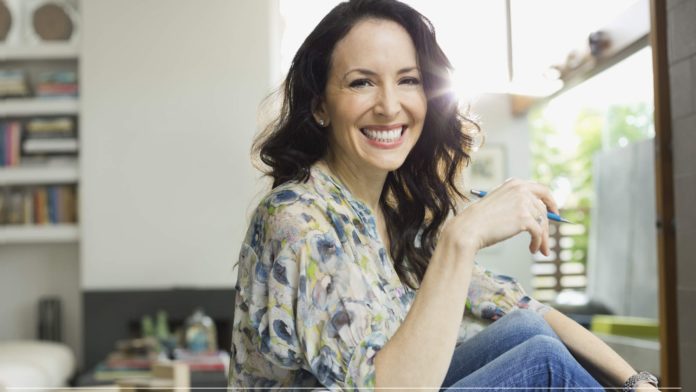 Portrait of designer sitting in home office